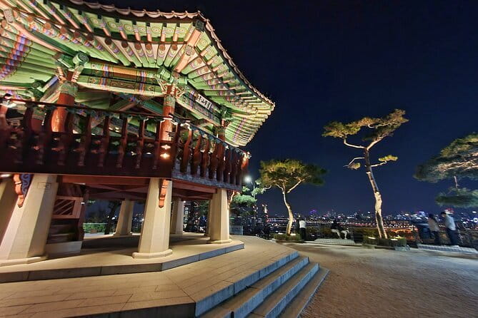 Seoul City Night View and Foodie Walking Tour - Naksan Park and the city wall glow, plus K-pop filming vibes