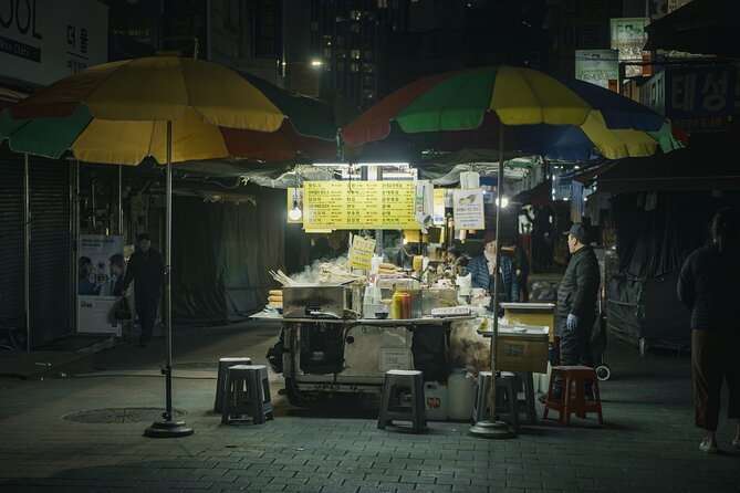 Seoul History Tour: Dark Past & Market Street Flavors - Seoul City Hall and Sungnyemun Gate: a living marker of change