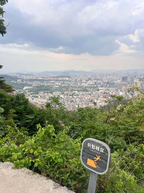 Seoul: Inwangsan Sunset Hike with Guide - Hanyang Fortress Wall stories: how your guide makes the skyline mean something