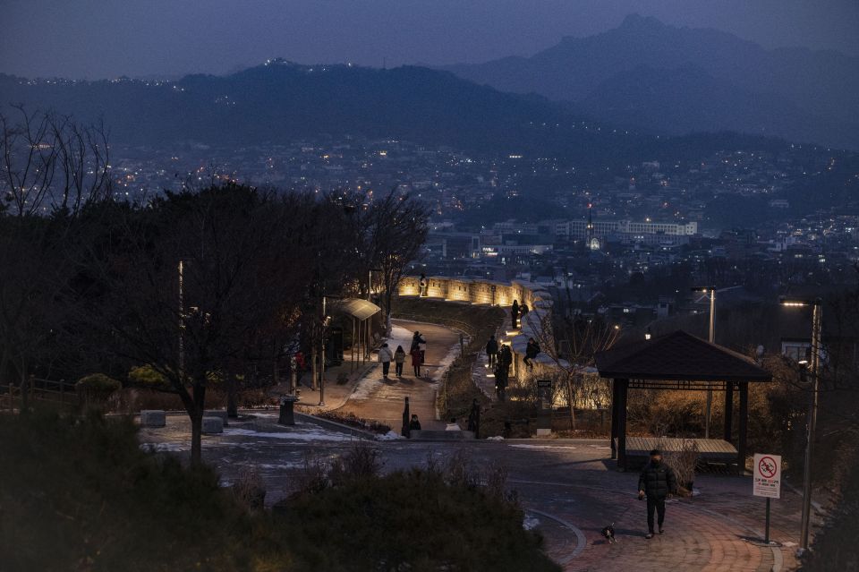Seoul: Nighttime Hidden Gems Walking Tour - Ehwa Mural Village after dark: art walls with a real hillside vibe